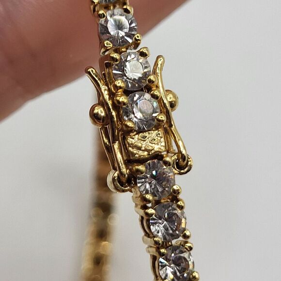 Gorgeous Tennis Bracelet Crystal With Gold tone Signed Safety Clasp 7.5in - Picture 1 of 4